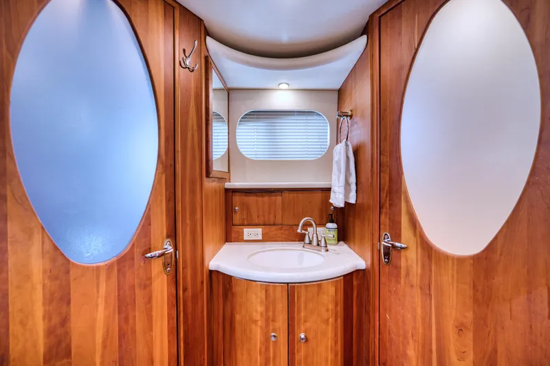 Slide: The Image of Luxurious bedroom in a 2003 Silverton 43 Motor Yacht. - 33