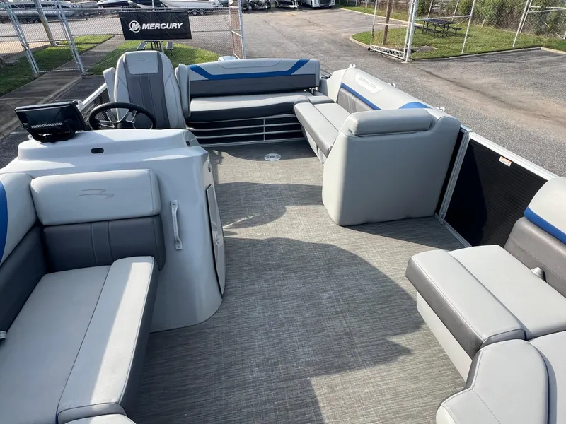 Slide: The Image of 2022 Bennington SX 20 Swingback pontoon boat interior with spacious seating and modern design. - 14