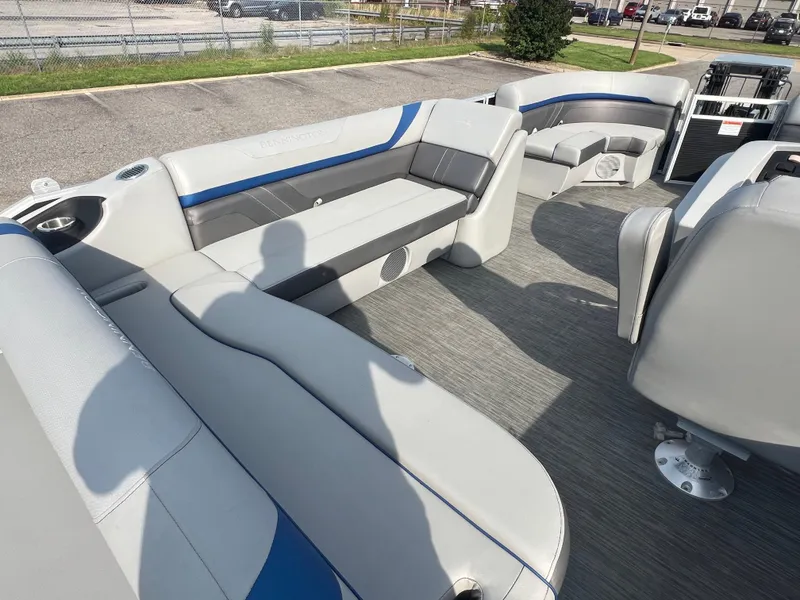 Slide: The Image of 2022 Bennington SX 20 Swingback pontoon boat interior with gray and blue seating. - 18