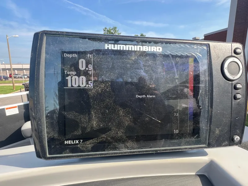Slide: The Image of Humminbird Helix 7 fish finder on 2022 Bennington SX 20 Swingback, displaying depth and temperature. - 28