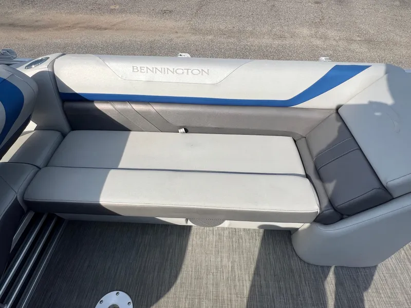 Slide: The Image of 2022 Bennington SX 20 Swingback boat seat with gray and blue upholstery. - 33