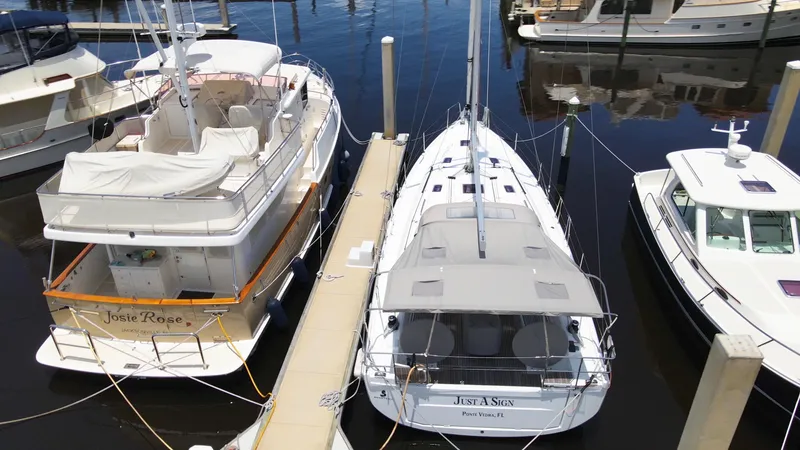 Slide: The Image of Beneteau Oceanis 40.1 yacht docked alongside other boats, 2022 model. - 4