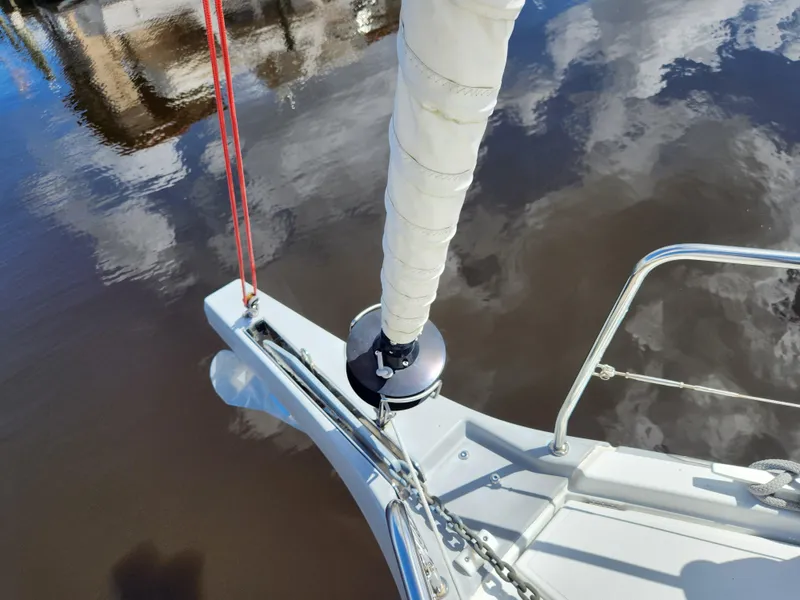 Slide: The Image of Beneteau Oceanis 40.1 sailboat bow detail, 2022 model, with water reflection. - 42