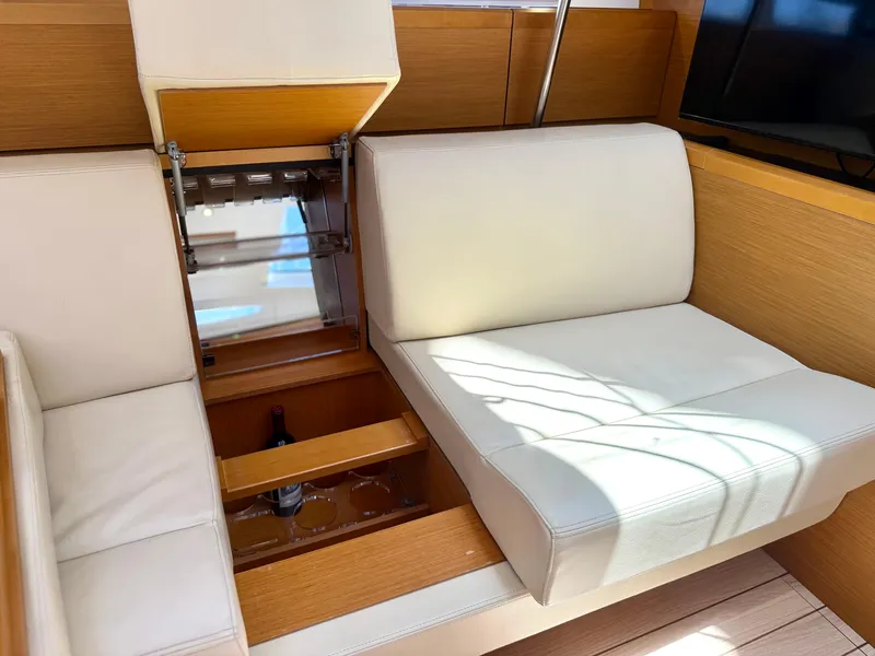 Slide: The Image of Luxurious Jeanneau 58 yacht interior with hidden wine storage, 2018 model. - 13