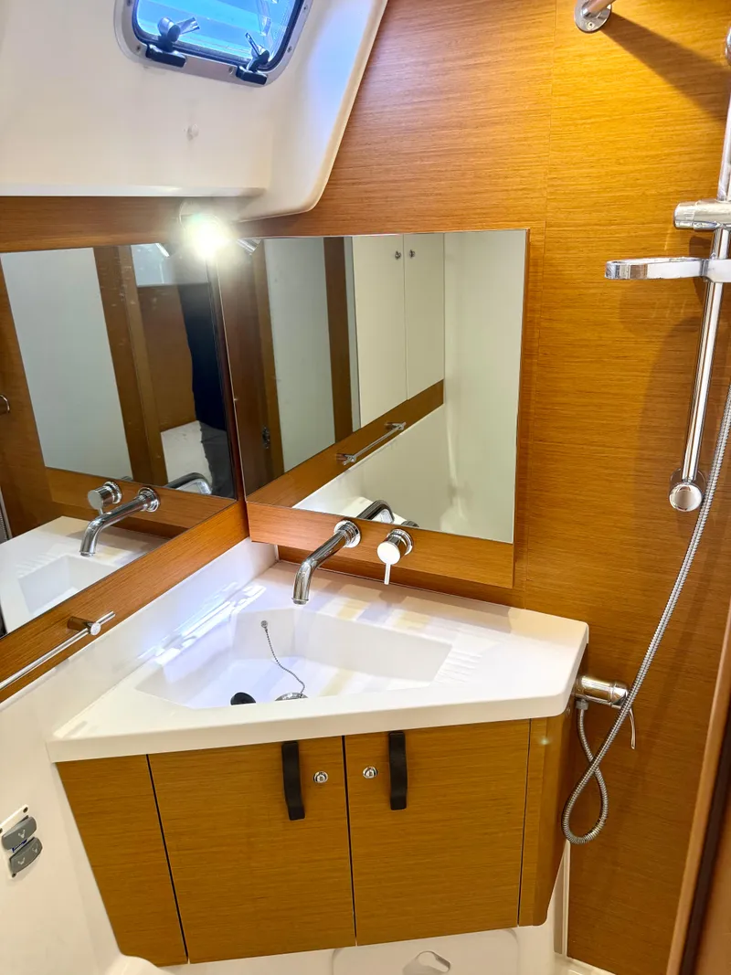 Slide: The Image of Bathroom interior of 2018 Jeanneau 58 yacht with modern sink and shower. - 27