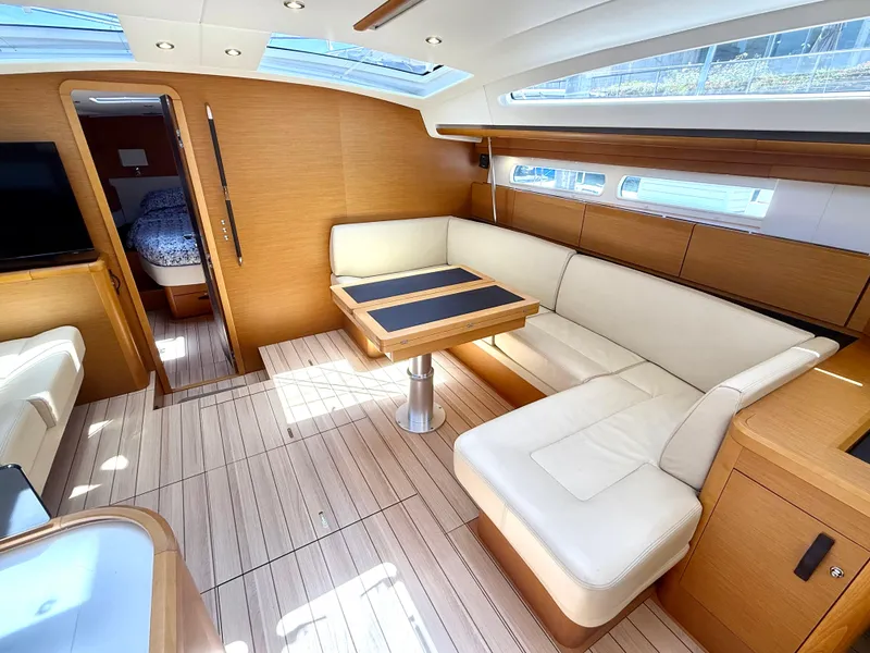 Slide: The Image of Luxurious interior of 2018 Jeanneau 58 yacht with elegant seating and modern design. - 4