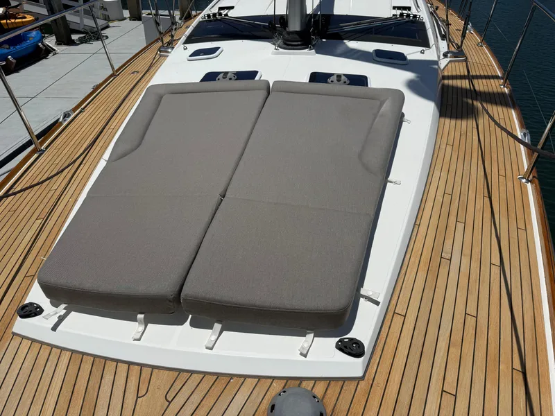 Slide: The Image of Deck of 2018 Jeanneau 58 yacht with sun loungers and teak flooring. - 40