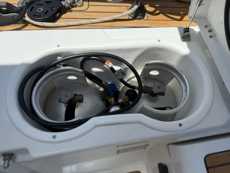 Slide: The Image of Propane storage compartment on a 2018 Jeanneau 58 yacht deck. - 49