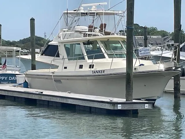 Slide: The Image of 2001 Albin 31' Tournament Express boat docked at marina. - 0