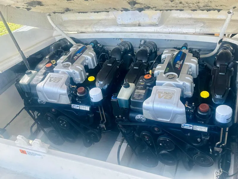 Slide: The Image of Twin engines in a 2015 Chris-Craft Launch 32 boat, showcasing powerful V8 configuration. - 12