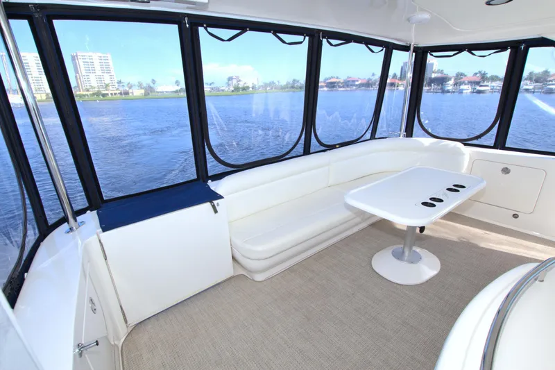 Slide: The Image of Luxurious interior of 2003 Sea Ray 480 Motor Yacht with waterfront view. - 18