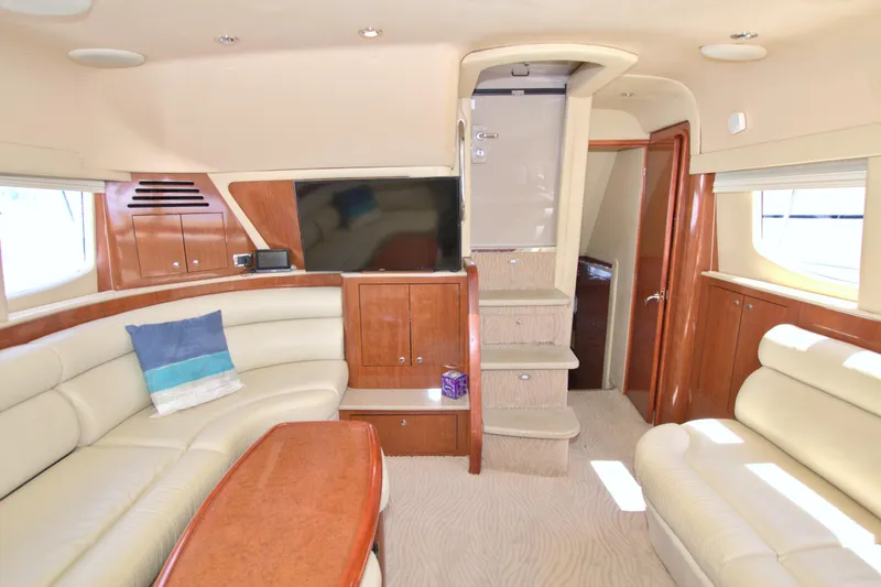 Slide: The Image of Luxurious interior of 2003 Sea Ray 480 Motor Yacht with plush seating and modern amenities. - 30