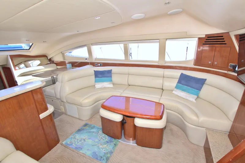 Slide: The Image of Luxurious interior of 2003 Sea Ray 480 Motor Yacht with plush seating and elegant wood finishes. - 41