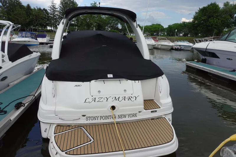 Slide: The Image of 2007 Sea Ray 280 Sundancer docked, covered, with "Lazy Mary" name, Stony Point, New York. - 2