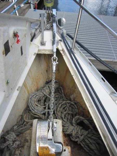 Slide: The Image of Anchor chain and ropes on a 1990 Jeanneau Sun Magic 44 sailboat deck. - 29