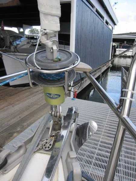 Slide: The Image of Jeanneau Sun Magic 44 sailboat, 1990, docked with visible furling system and deck details. - 30