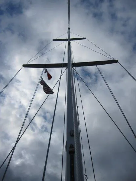 Slide: The Image of Mast of 1990 Jeanneau Sun Magic 44 sailboat against cloudy sky. - 36
