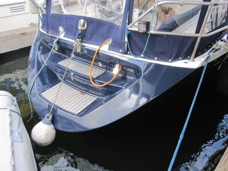 Slide: The Image of Jeanneau Sun Magic 44 yacht stern, 1990 model, docked with fender and ropes. - 40