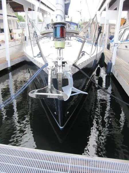 Slide: The Image of Jeanneau Sun Magic 44 sailboat docked, front view, 1990 model. - 49