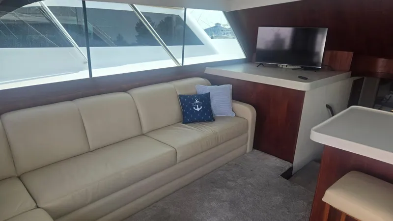 Slide: The Image of Cozy cabin bedroom in 1984 Ocean Yachts 46 Super Sport with nautical decor. - 24