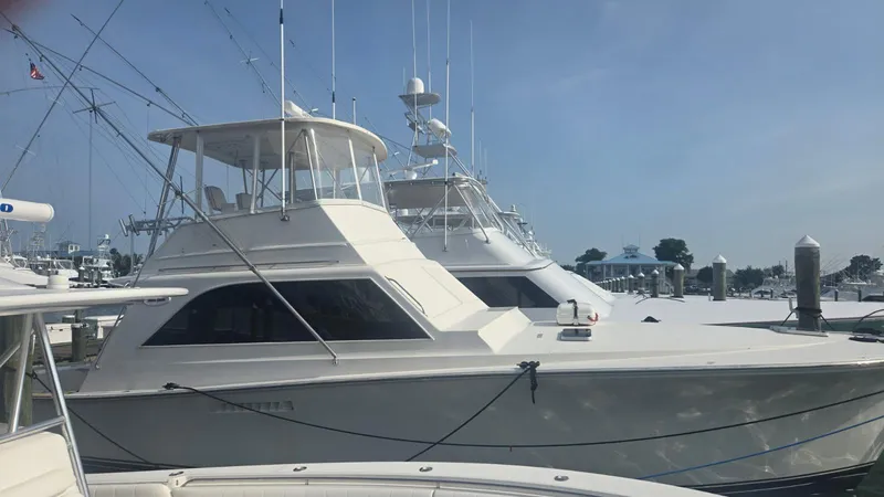 Slide: The Image of Bathroom interior of 1984 Ocean Yachts 46 Super Sport, featuring toilet and storage cabinets. - 26