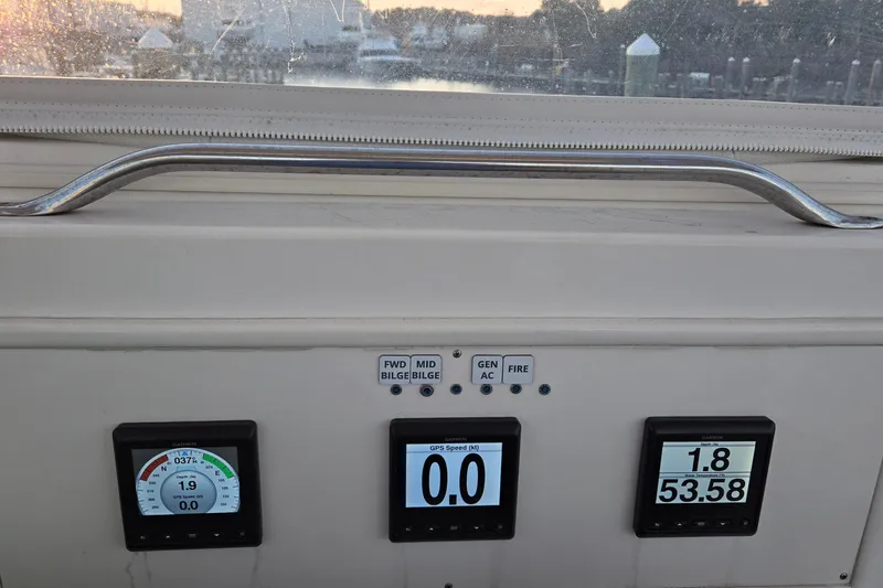 Slide: The Image of Dashboard of 1984 Ocean Yachts 46 Super Sport with GPS and sonar display. - 30