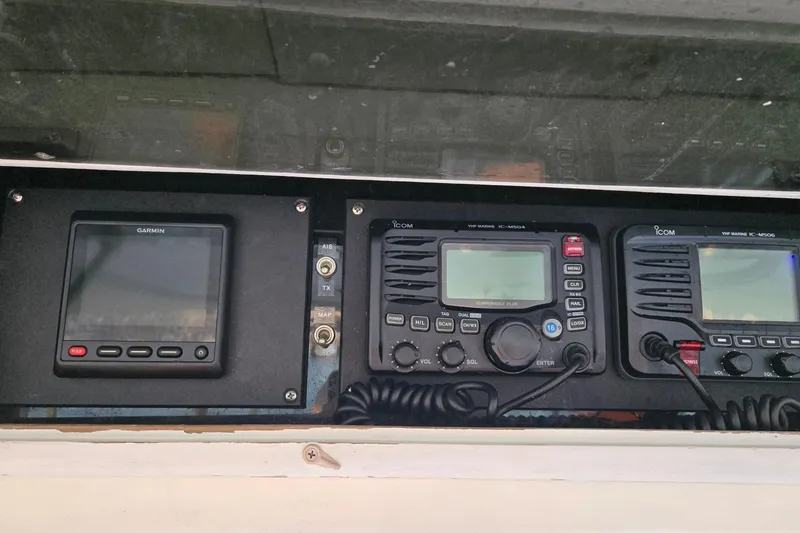 Slide: The Image of Fishing rods and gear stored on a 1984 Ocean Yachts 46 Super Sport. - 28