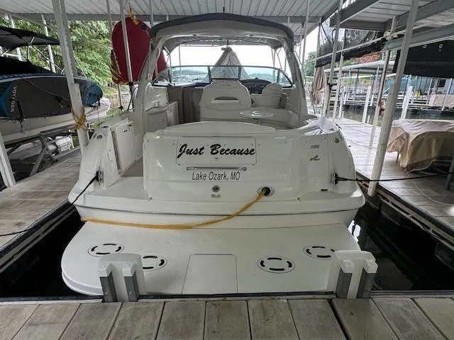 Slide: The Image of 1999 Sea Ray 38' Sundancer docked at Lake Ozark, MO, named "Just Because." - 2