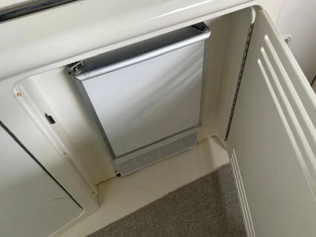 Slide: The Image of Built-in refrigerator on a 1999 Sea Ray 38' Sundancer yacht. - 21