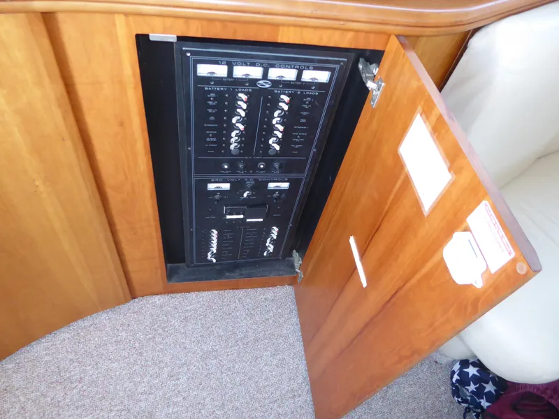 Slide: The Image of Electrical panel inside a 2000 Silverton 42C Cummins 450 Diesels yacht. - 18