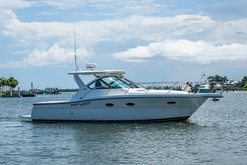 Slide: The Image of 2008 Tiara Yachts 3200 Open cruising on a calm, scenic waterway. - 0