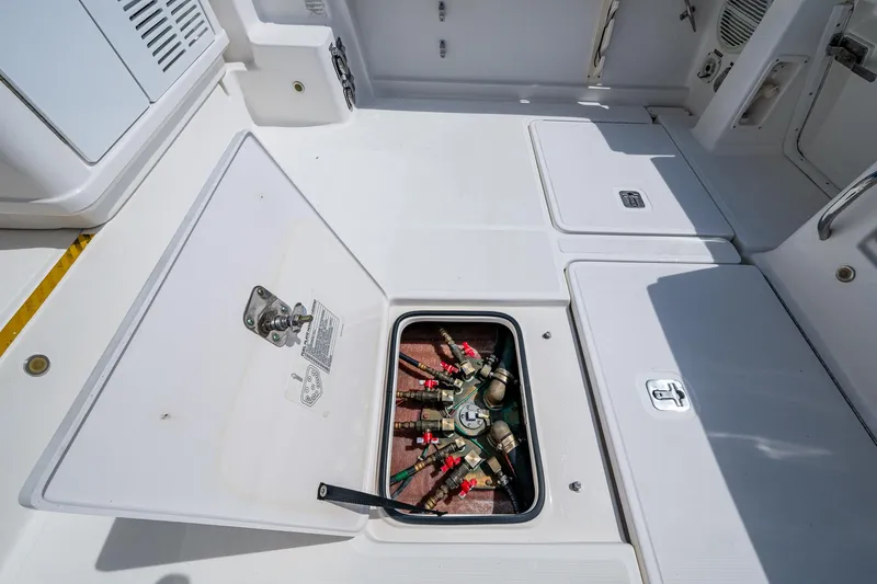 Slide: The Image of Open hatch on 2008 Tiara Yachts 3200 Open, revealing mechanical components. - 22