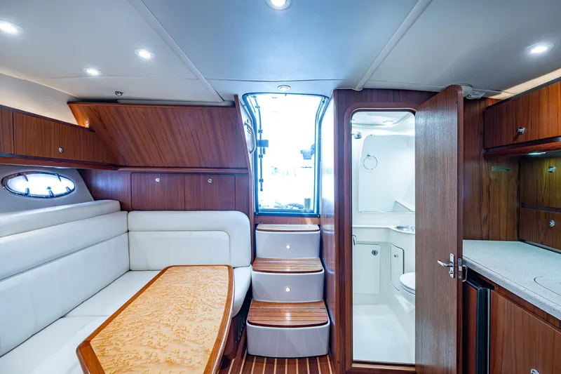 Slide: The Image of Luxurious interior of 2008 Tiara Yachts 3200 Open, featuring wood finishes and modern amenities. - 39