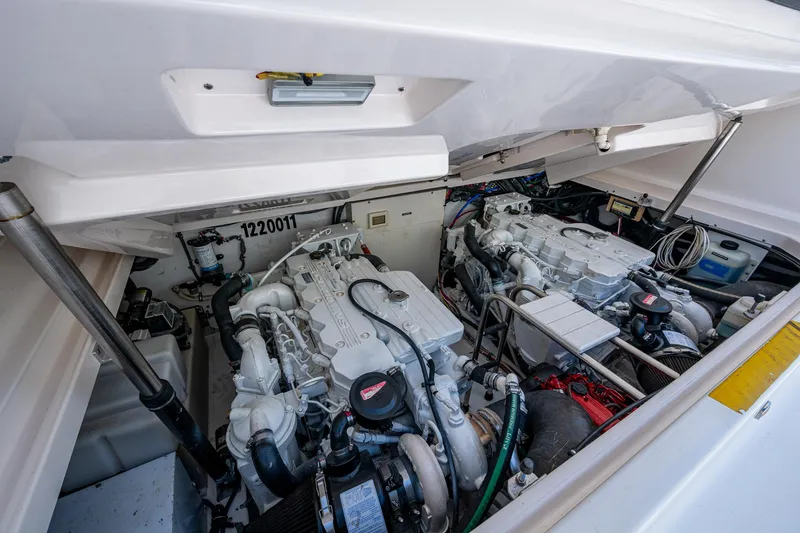Slide: The Image of Engine compartment of a 2008 Tiara Yachts 3200 Open, showcasing dual engines. - 42