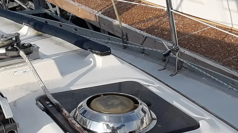 Slide: The Image of Deck of a 1990 Hunter 28 sailboat with winch and rigging details. - 26