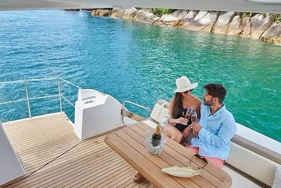 Slide: The Image of Couple enjoying a romantic moment on a 2026 Schaefer 510 GT Pininfarina yacht. - 10