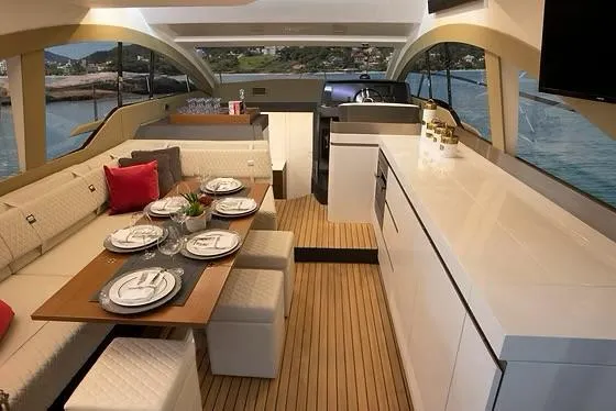 Slide: The Image of Luxurious interior of 2026 Schaefer 510 GT Pininfarina yacht with elegant dining area. - 16