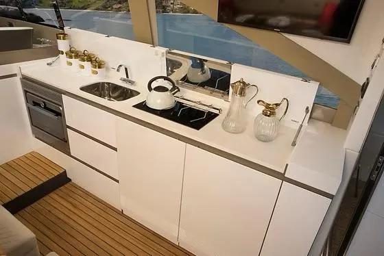 Slide: The Image of Modern kitchen interior on 2026 Schaefer 510 GT Pininfarina yacht with sleek design and appliances. - 17