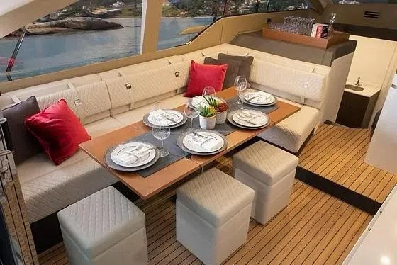 Slide: The Image of Luxurious dining area on 2026 Schaefer 510 GT Pininfarina yacht with elegant table setting. - 18