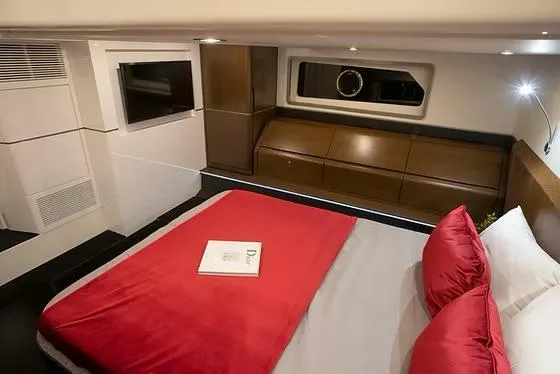 Slide: The Image of Luxurious cabin interior of 2026 Schaefer 510 GT Pininfarina yacht with red bedding. - 40