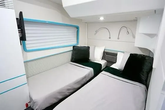 Slide: The Image of Interior of 2026 Schaefer 510 GT Pininfarina yacht with twin beds and modern design. - 43