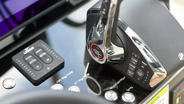 Slide: The Image of Control panel of 2025 Schaefer V33 boat with throttle and buttons. - 11