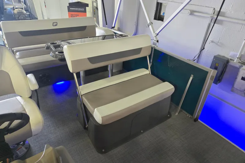 Slide: The Image of 2025 Princecraft Vectra 23 RL boat interior with modern seating and ambient lighting. - 14