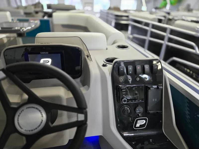 Slide: The Image of 2025 Princecraft Vectra 23 RL boat dashboard with steering wheel and control panel. - 4