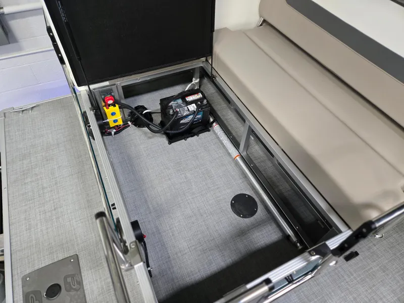 Slide: The Image of 2025 Princecraft Vectra 23 RL interior showing battery compartment and seating area. - 8
