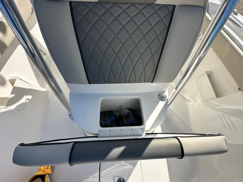 Slide: The Image of 2025 Key West 239 FS boat seat with storage compartment, featuring quilted upholstery. - 12