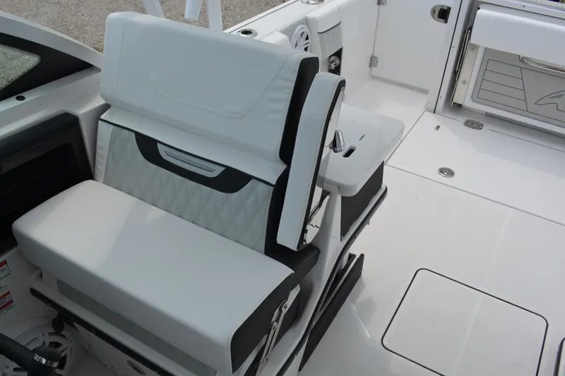 Slide: The Image of 2026 Blackfin 252 DC boat interior with white seating and modern design. - 18