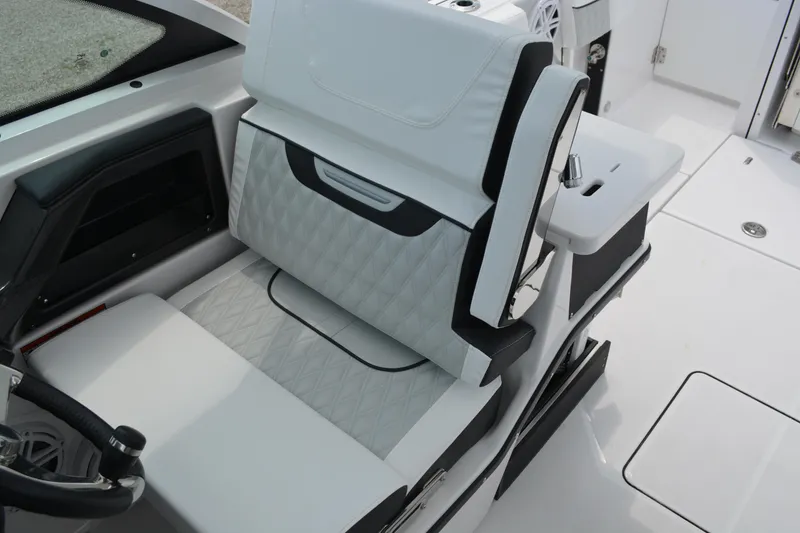 Slide: The Image of 2026 Blackfin 252 DC boat interior with luxurious white seating and modern design. - 20