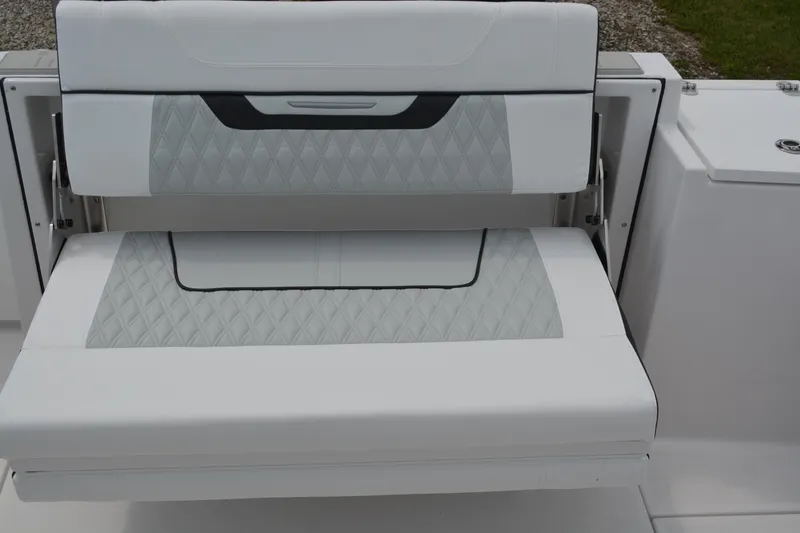 Slide: The Image of 2026 Blackfin 252 DC boat seat with diamond-patterned upholstery. - 26