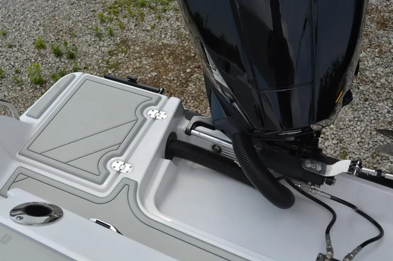 Slide: The Image of 2026 Blackfin 252 DC boat engine and deck detail, featuring sleek design and modern fittings. - 34